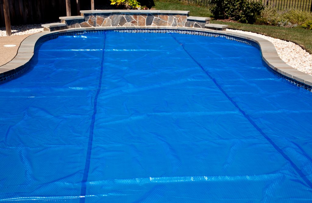 bigstock-blue-solar-pool-cover-9254441-1024x669