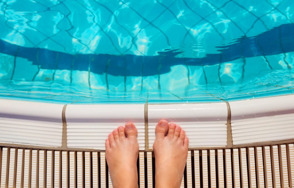 feet-at-the-swimming-pool-pwrb4rf-scaled-1024x655