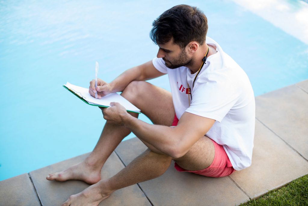 bigstock-lifeguard-writing-on-clipboard-184538887-1-1024x683