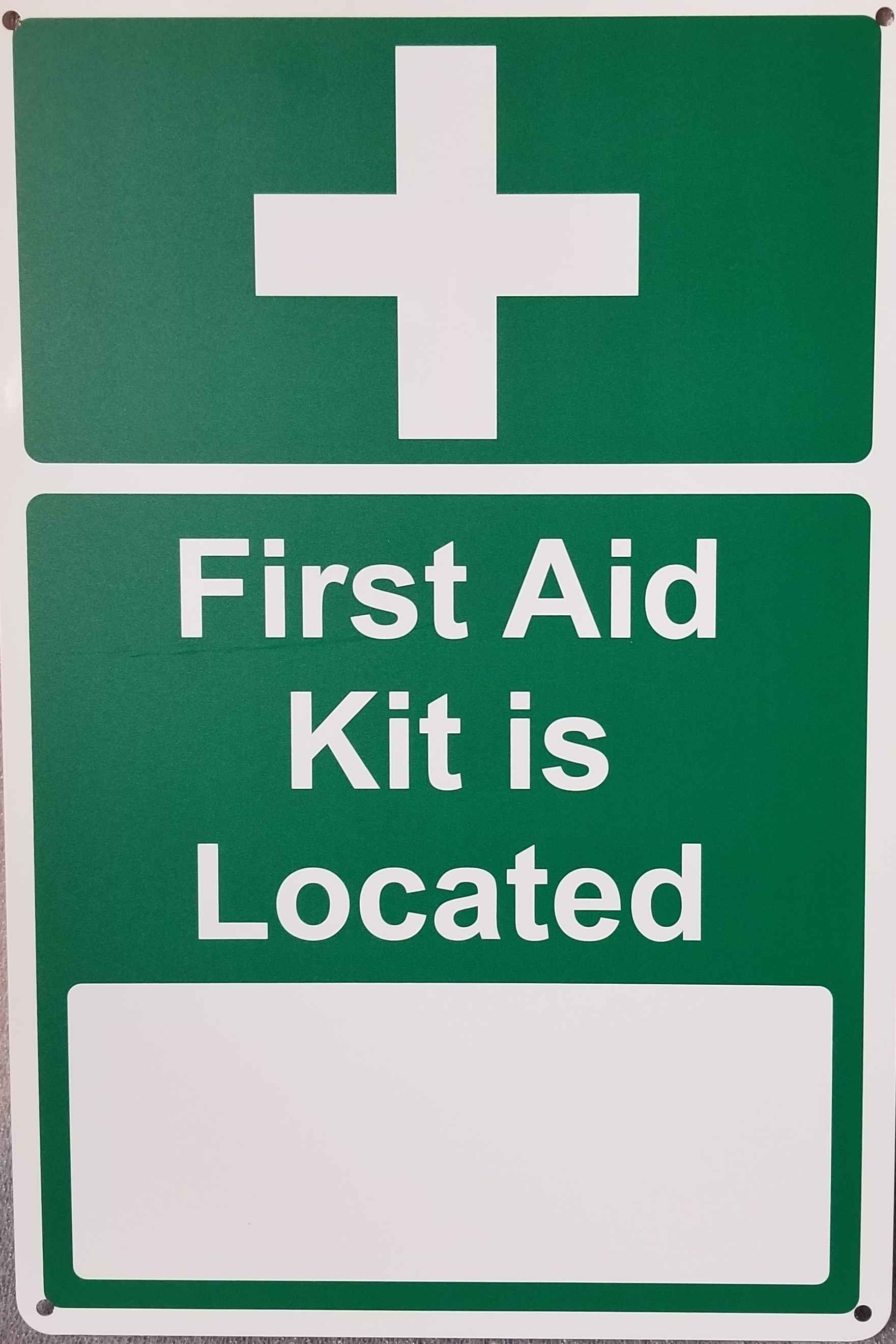 first aid kit location sign