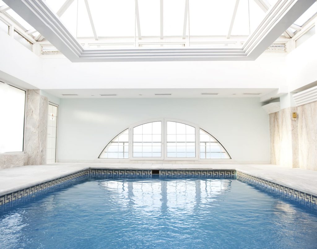bigstock-luxury-swimming-pool-with-lot-28365656-1024x803