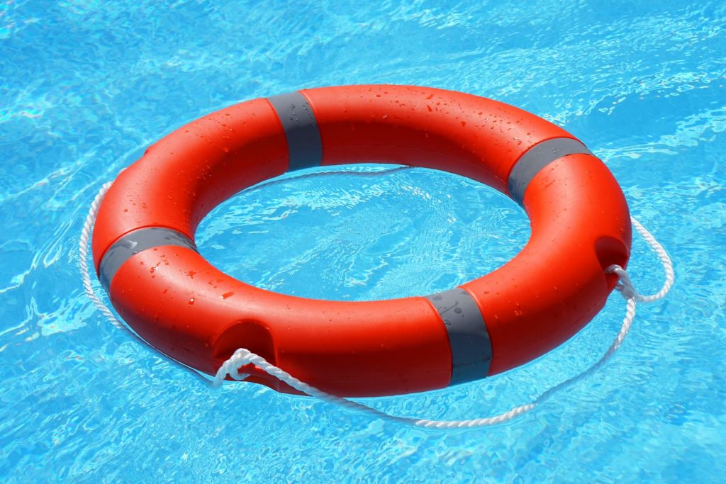 bigstock-red-lifebuoy-pool-ring-float-o-267267739-1024x683