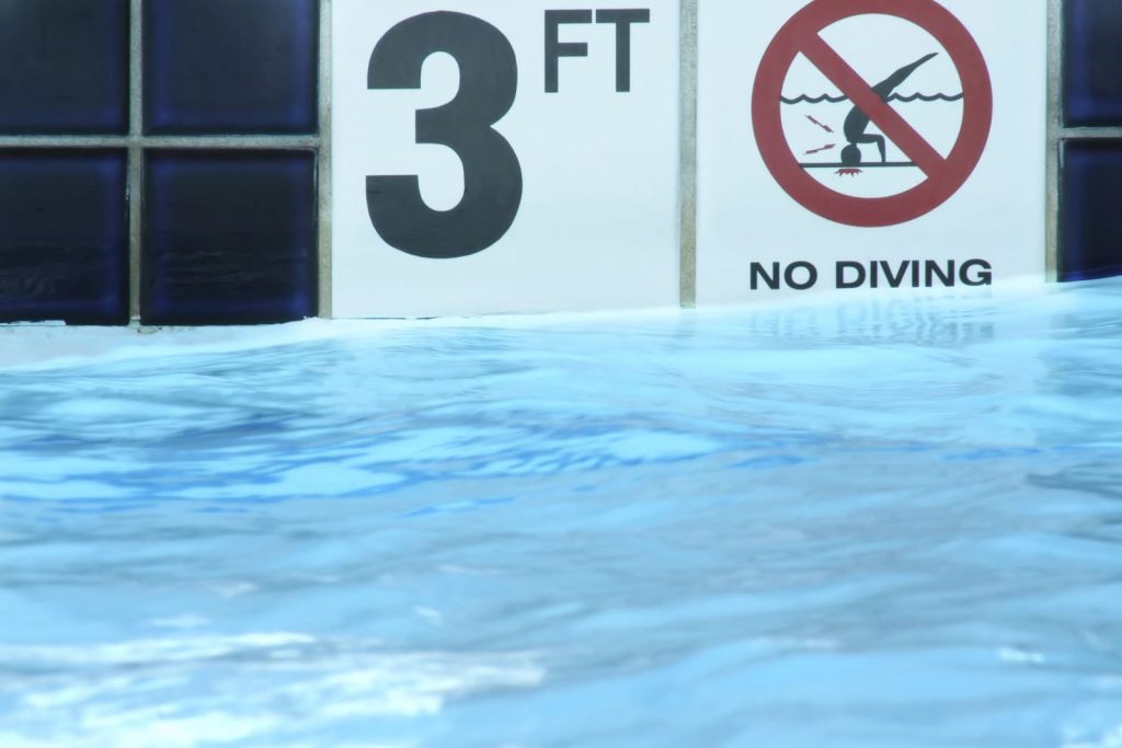 bigstock-feet-and-no-diving-sign-on-p-2480499-1024x683