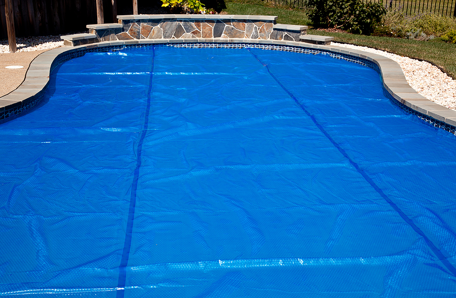 bigstock-blue-solar-pool-cover-9254441