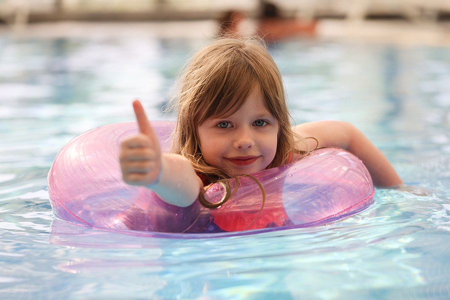 bigstock-little-girl-swimming-in-pool-u-424031393