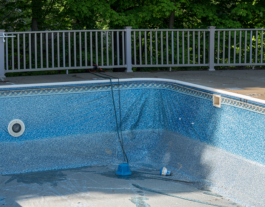 bigstock-empty-in-ground-swimming-pool-300218803