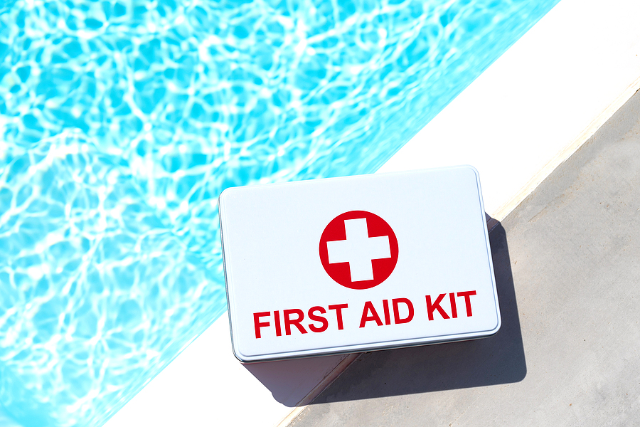 bigstock-first-aid-kit-near-swimming-po-251785297