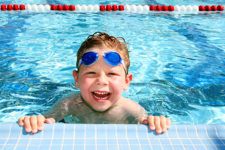 bigstock-happy-child-in-a-swimming-pool-4868383-1