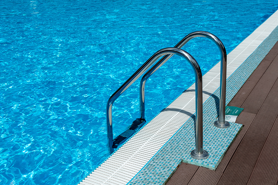 bigstock-handrail-on-pool-swimming-poo-430737146
