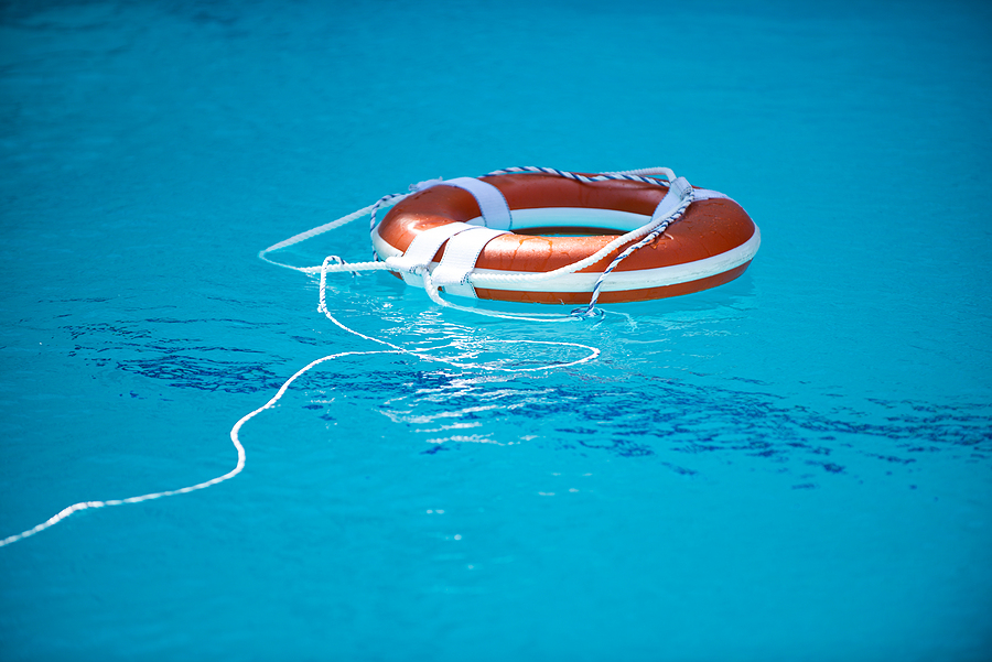 bigstock-life-buoy-in-blue-swimming-poo-458286715