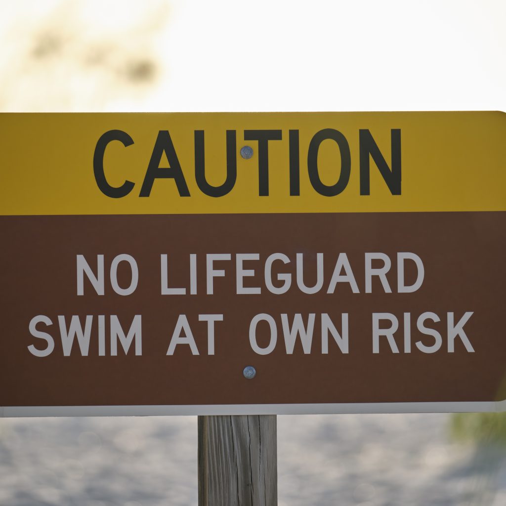warning-sign-poster-on-sea-side-beach-saying-that-2024-12-06-04-32-45-utc-1-1024x1024